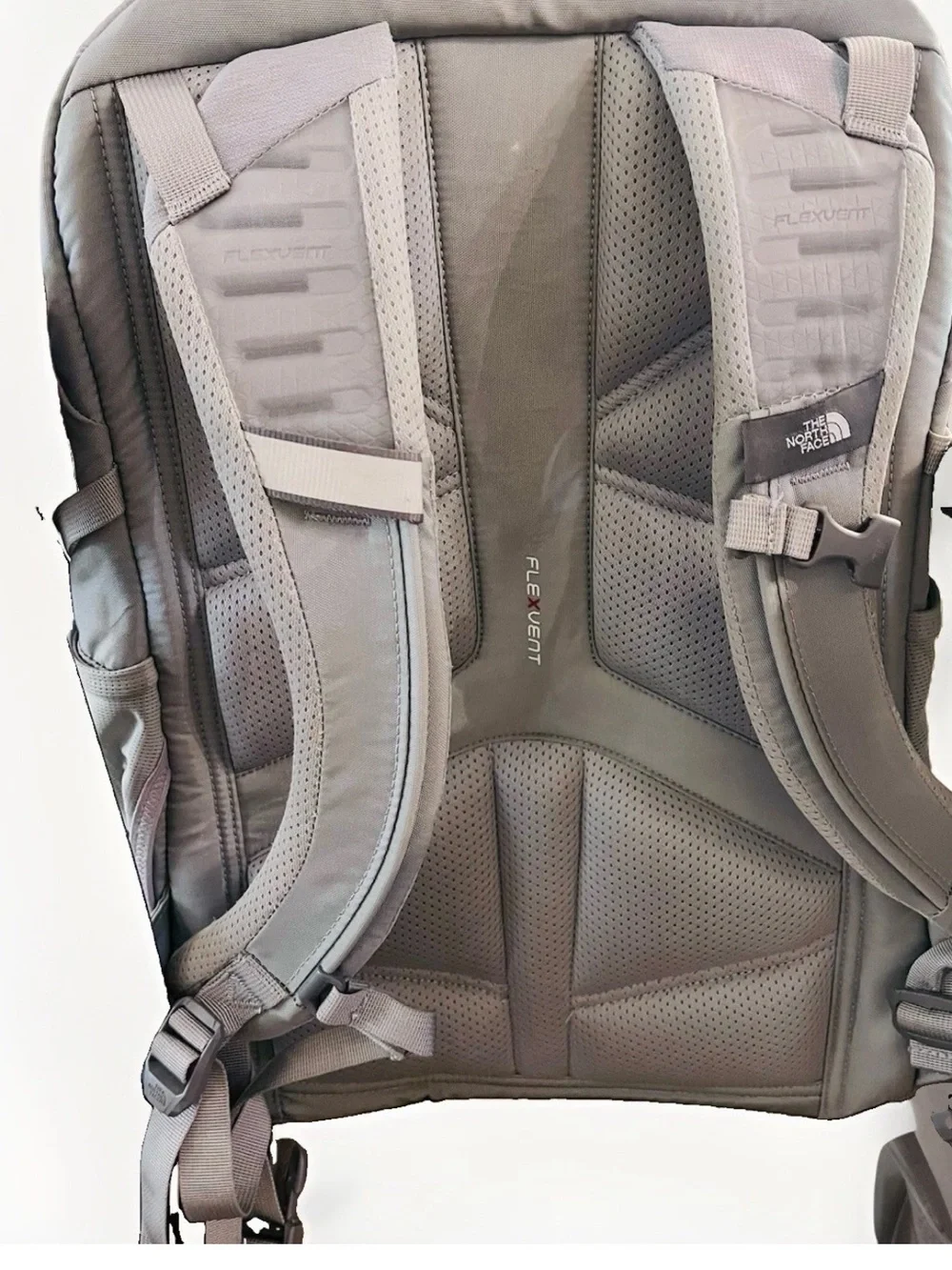 The North Face women’s Gray Backpack with Rose Accent